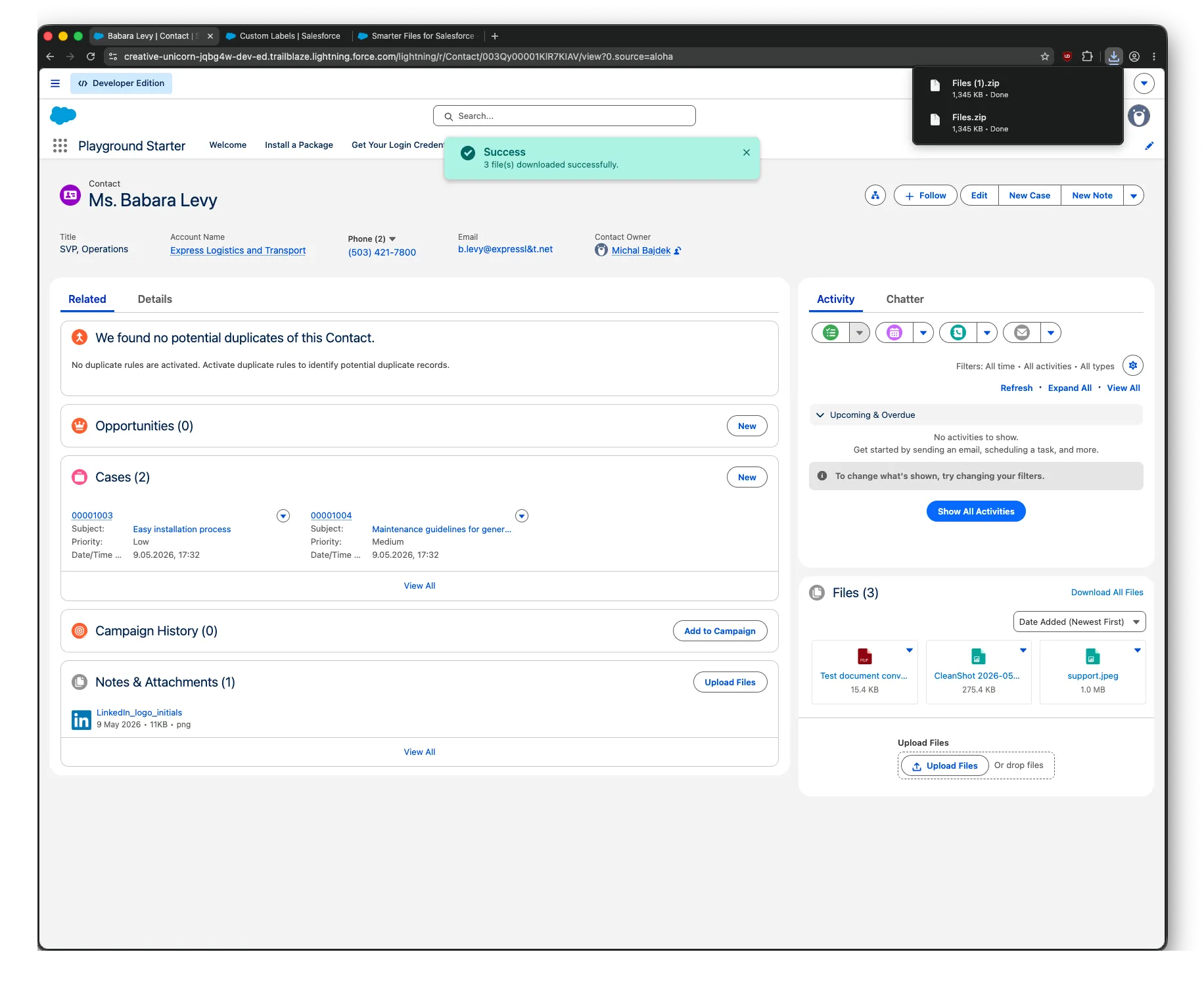 Files component with Download All in progress, showing a spinner