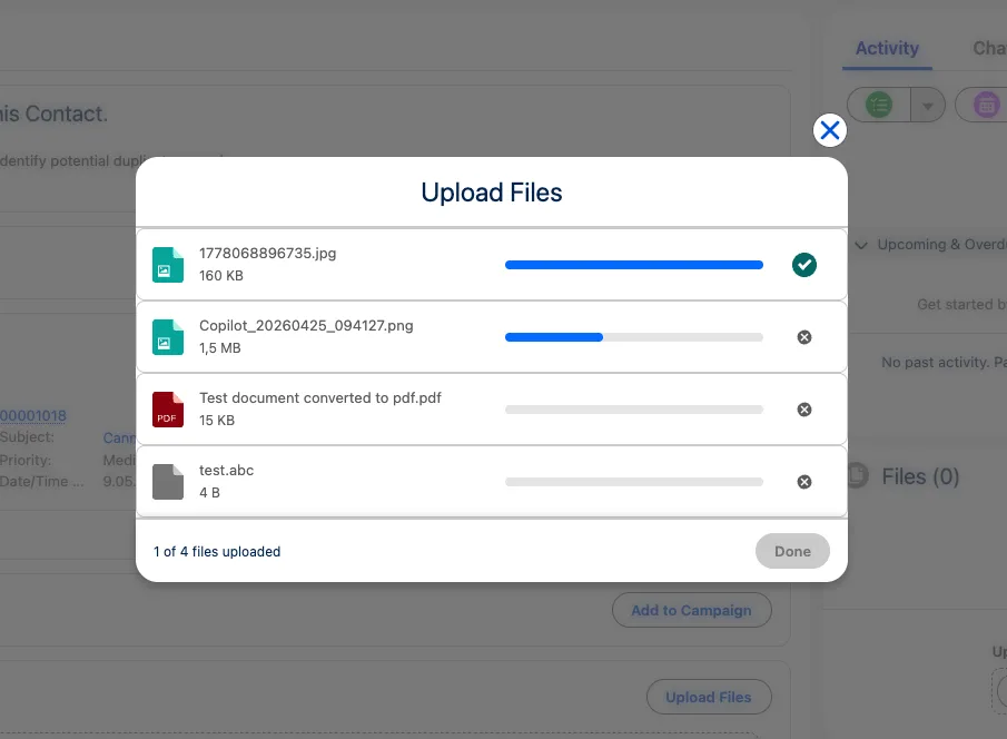 Upload Files modal showing one of four files uploaded with progress bars